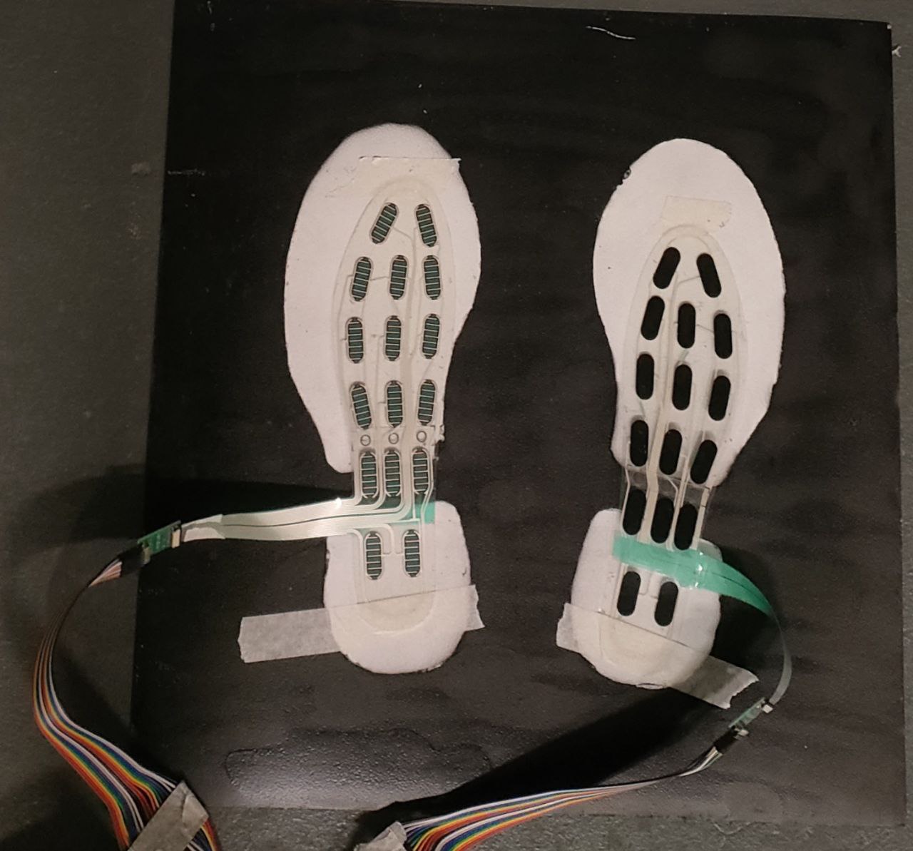 The final prototype comprises a flexible array of discrete sensors for noise reduction, and refined custom electronics for data processing and transmission.